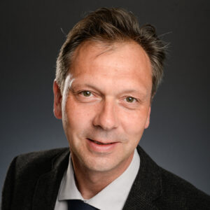 Das aktuelle Bild hat keinen Alternativtext. Der Dateiname ist: Huebner.jpg